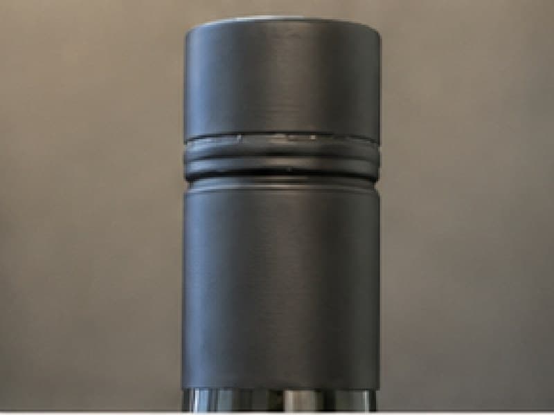 ELEVE closure in black on a wine bottle